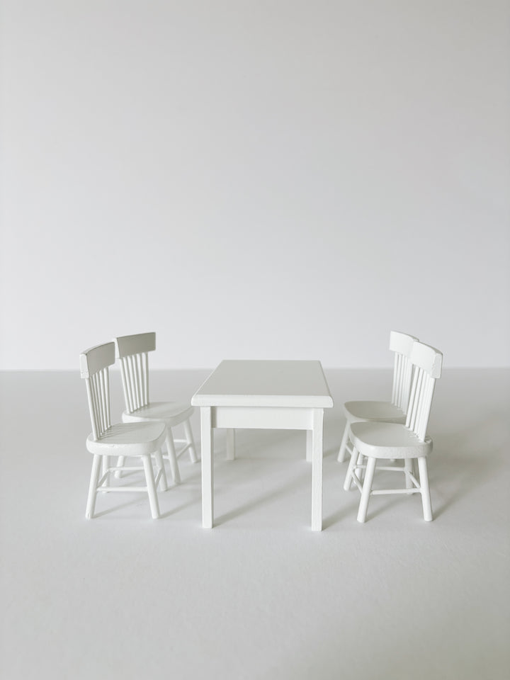 Miniature white dining table and chairs