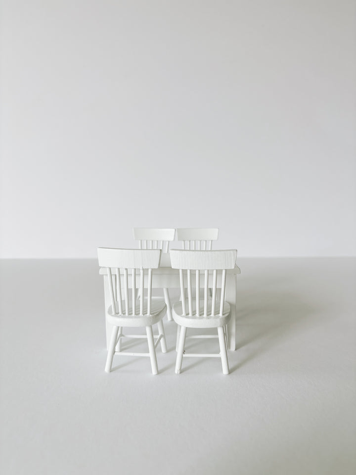 Miniature white dining table and chairs