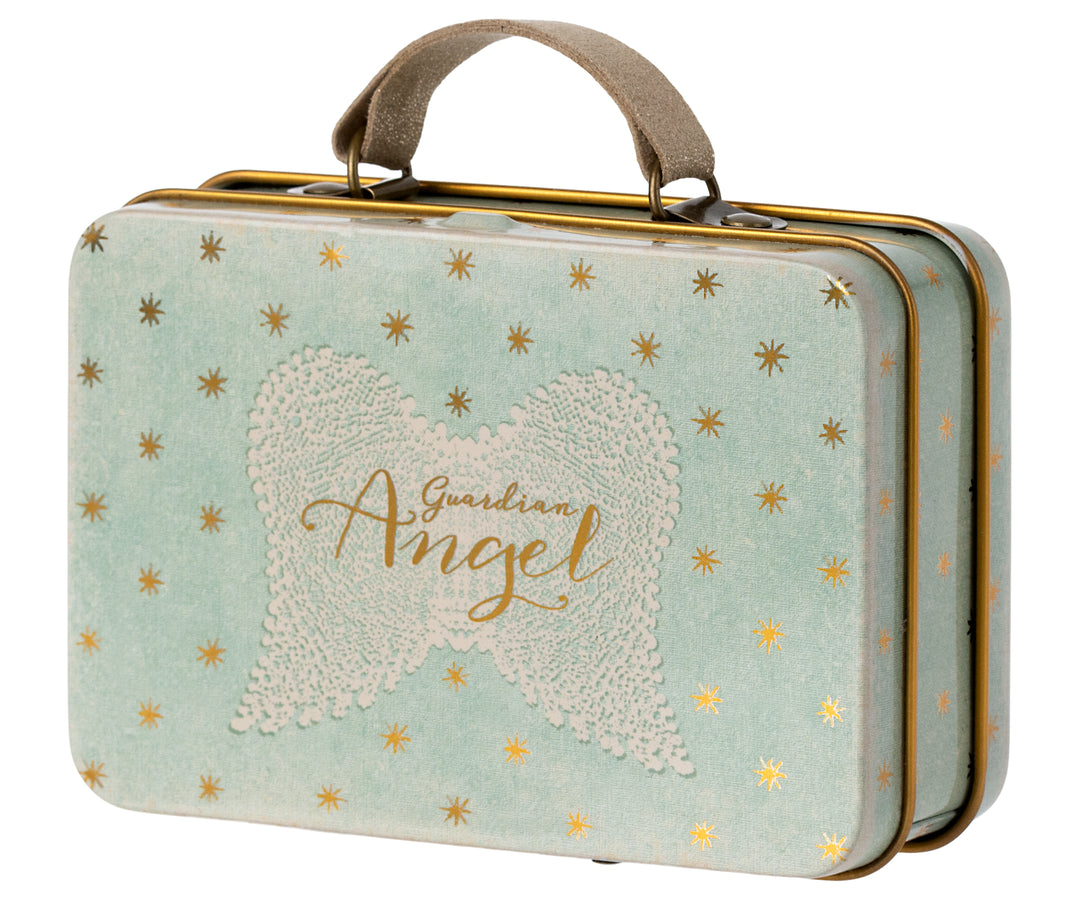 Angel mouse in suitcase